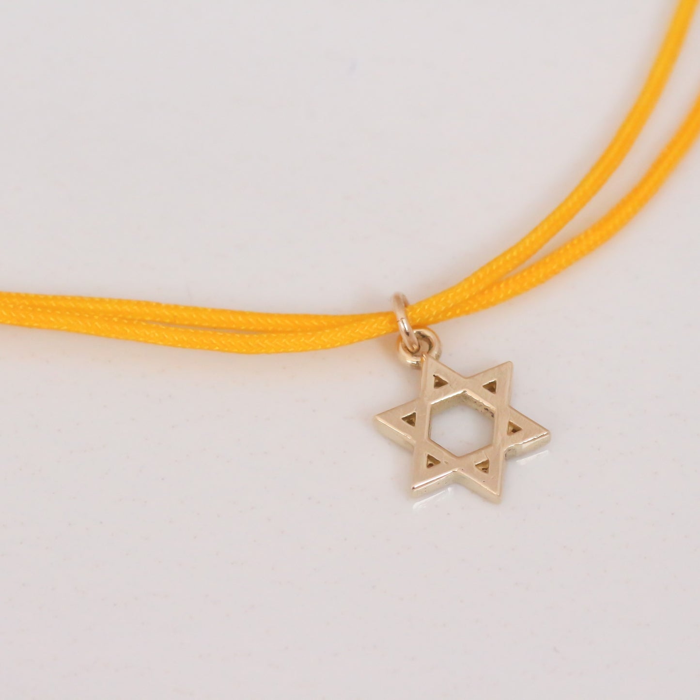 Star of David string bracelet 14k gold