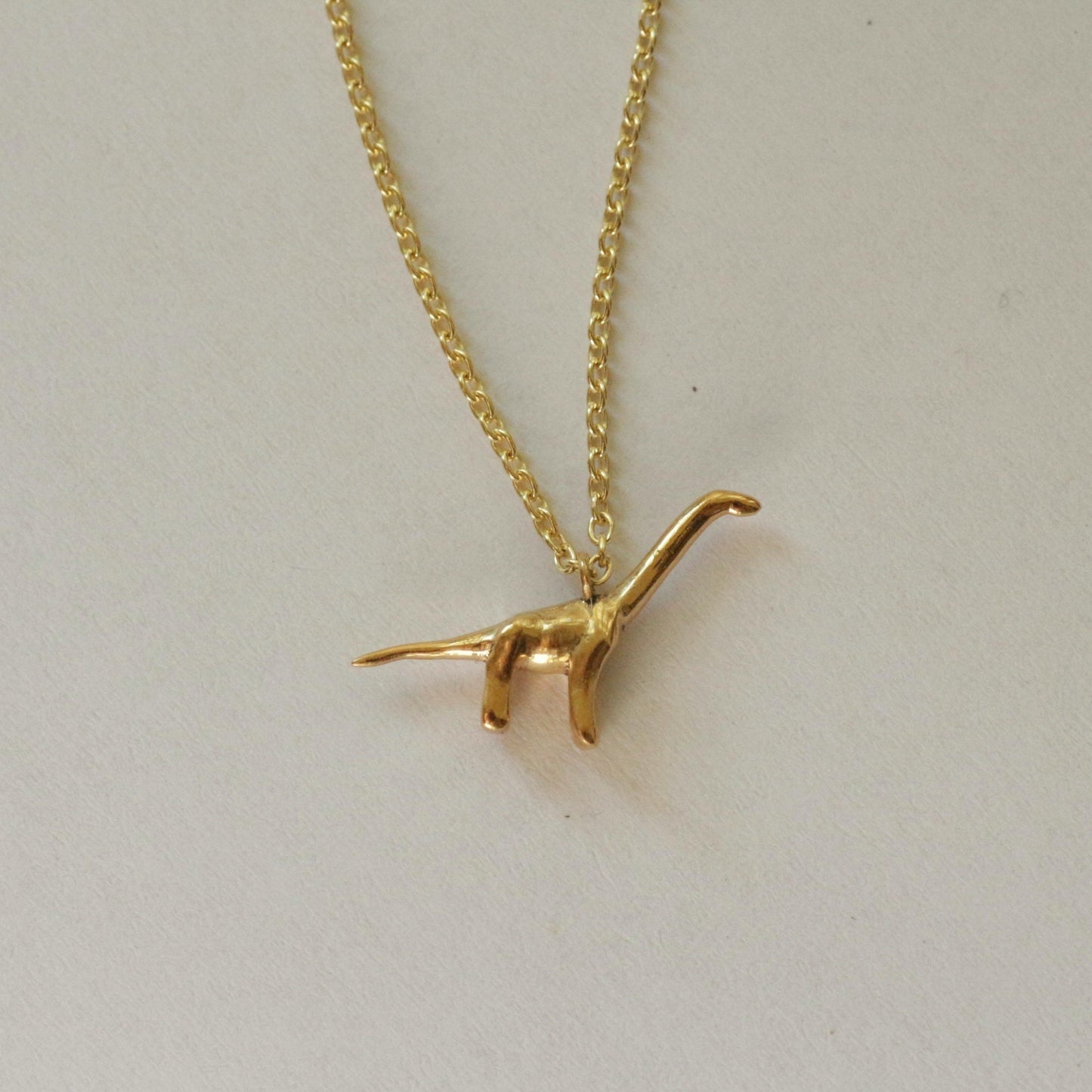 Brontosaurus necklace 14k gold